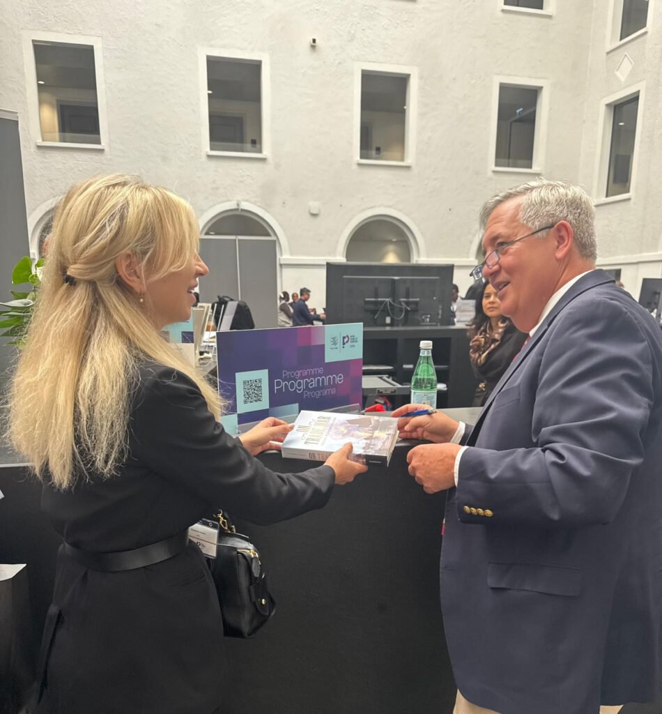 Craig VanGrasstek signing his book On Trade War during the WTO Public Forum 2026 in Geneva